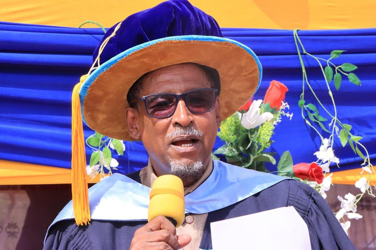 A guest speaker addresses the graduation